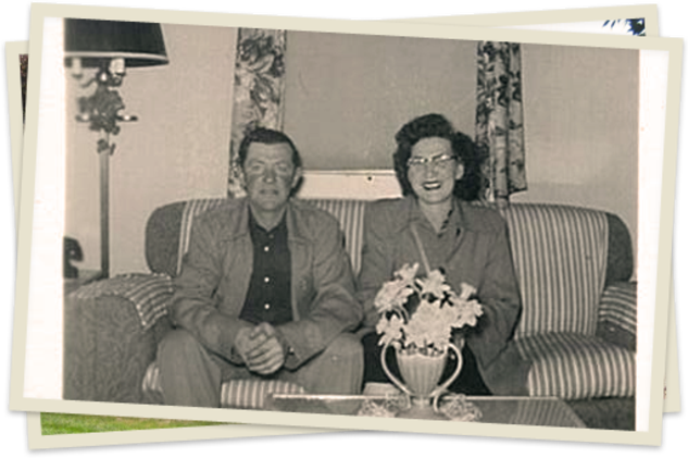 A man and woman sitting on the couch